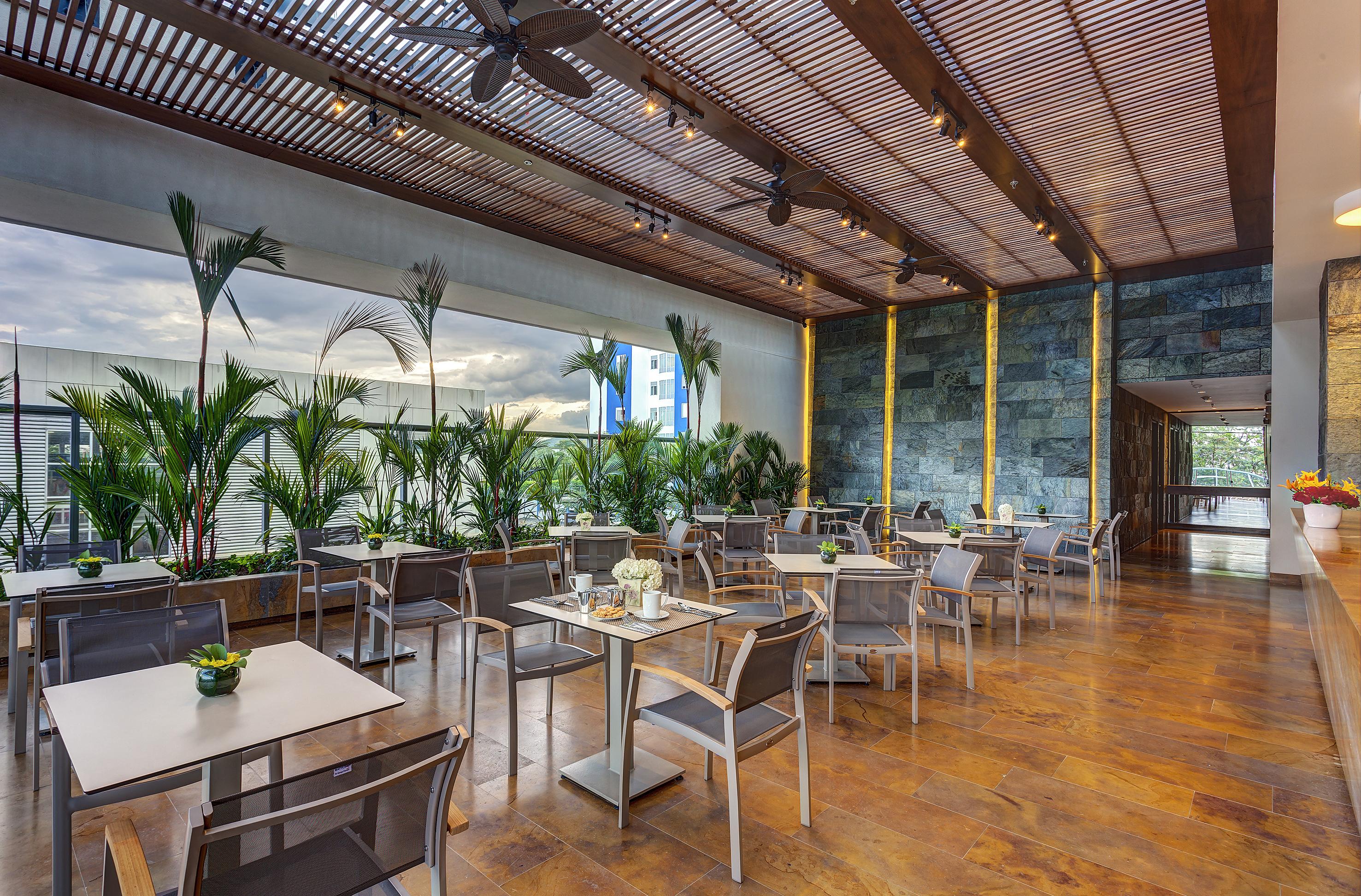 Estelar Villavicencio Hotel&Centro De Convenciones Exterior foto The interior of the restaurant