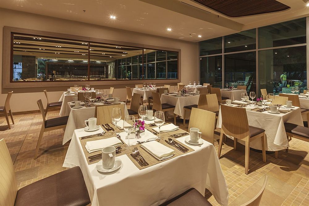 Estelar Villavicencio Hotel&Centro De Convenciones Exterior foto The interior of the restaurant