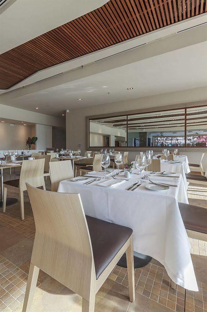 Estelar Villavicencio Hotel&Centro De Convenciones Exterior foto The interior of the restaurant